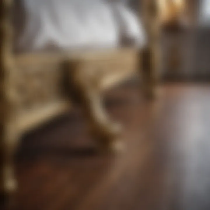 A close-up view of ornate brass bed feet showcasing intricate design details.