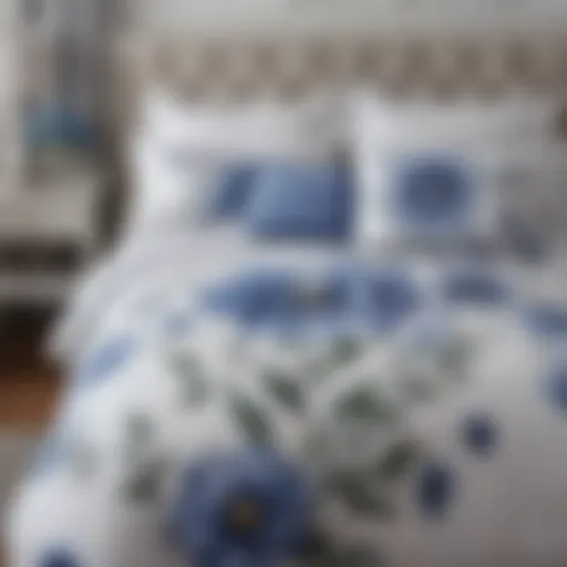 Elegant display of a blue flower comforter set on a neatly made bed